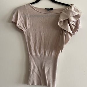 Elegant light pink top.